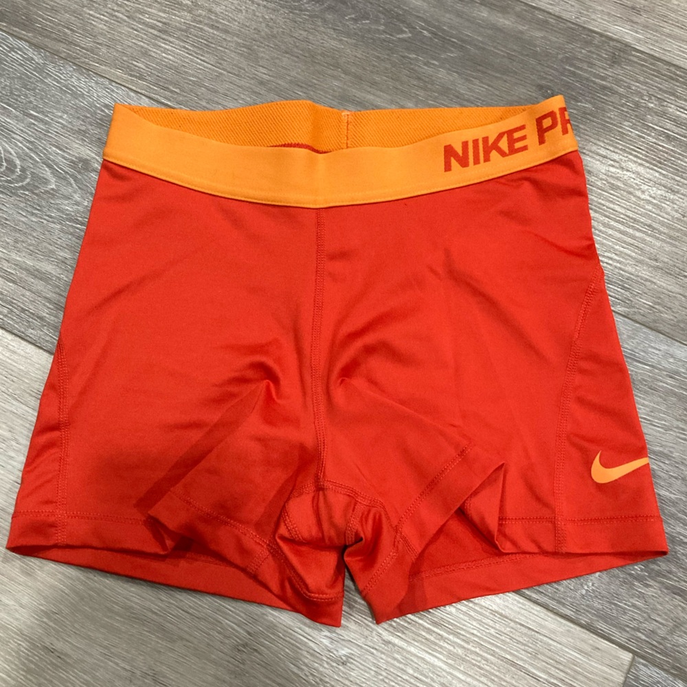 Nike Women’s Athletic Shorts in Red with Orange Waistband